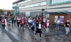 More than 70 runners took part in the annual Jingle Jog. Image Sandy McCook/DC Thomson