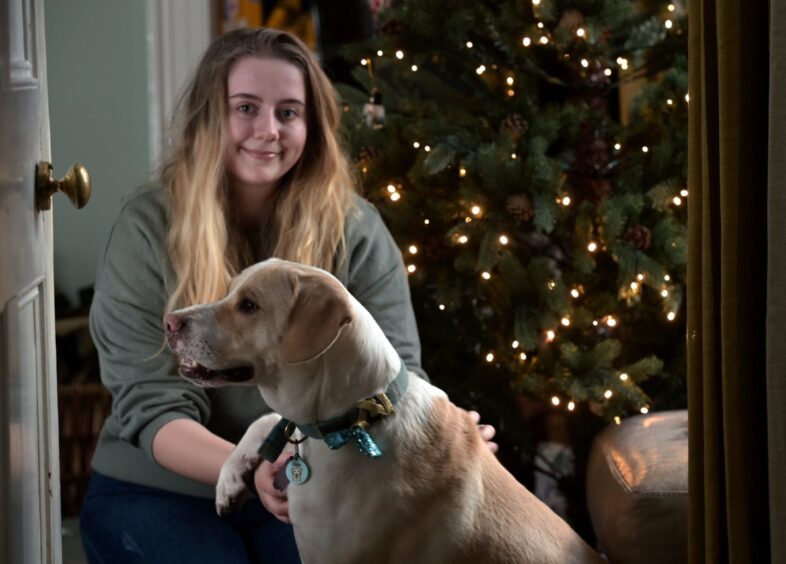 Abby Suddick with her rescue dog, Ollie