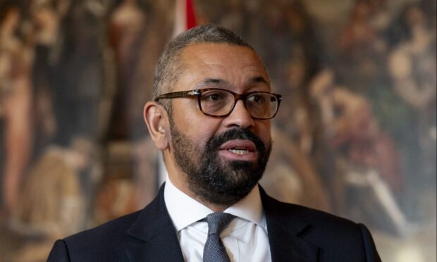 Home Secretary James Cleverly announced plans to cut met migration. Image: PA.