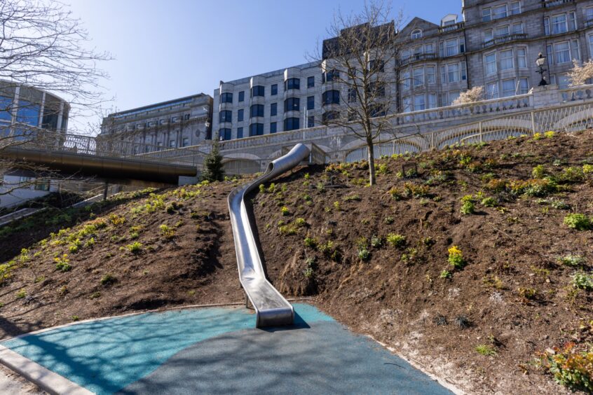 The slide goes between the upper walkway and the bottom of Union Terrace Gardens (UTG) in Aberdeen. UTG's £400,000 playpark. Image: Scott Baxter/DC Thomson 