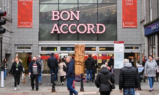 Shoppers outside the Bon Accord Centre in Aberdeen