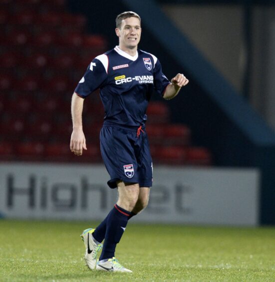 Michael Tidser in action for Ross County.