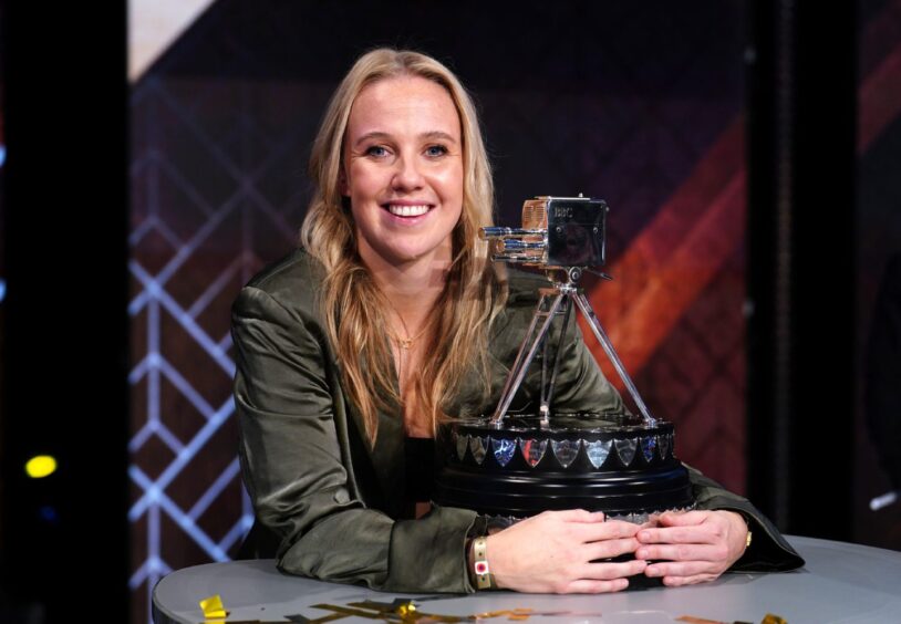 England footballer Beth Mead poses with the BBC Sports Personality of the Year Award after winning in 2022.