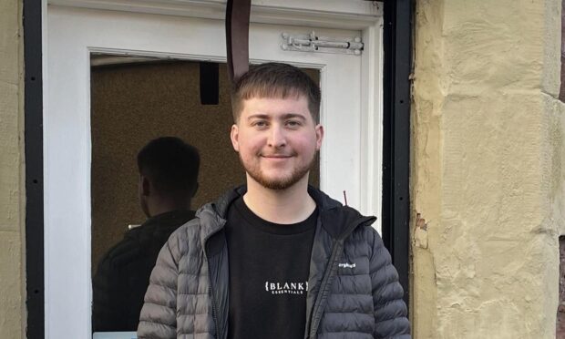 Sean Macleod outside of his new Inverness barbers. Image: Sean Macleod
