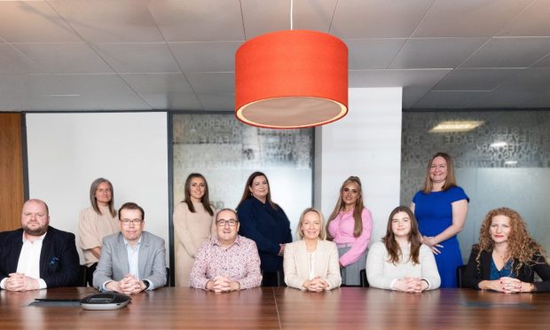 Thorntons' new team in Inverness with managing partner Lesley Larg. In the back row, l-r, are Krysty Steele, Yasmin Myles, Anna Macleod-Adams, Lucy Bird and Elisa Miller. In the front row, l-r, are Paul Adams, John Smart, Ewan Miller, Ms Larg, Jennifer Callaghan and Hazel MacGillivray.