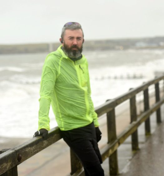 Chief planner David Dunne at Aberdeen beach. Image: Darrell Benns/DC Thomson