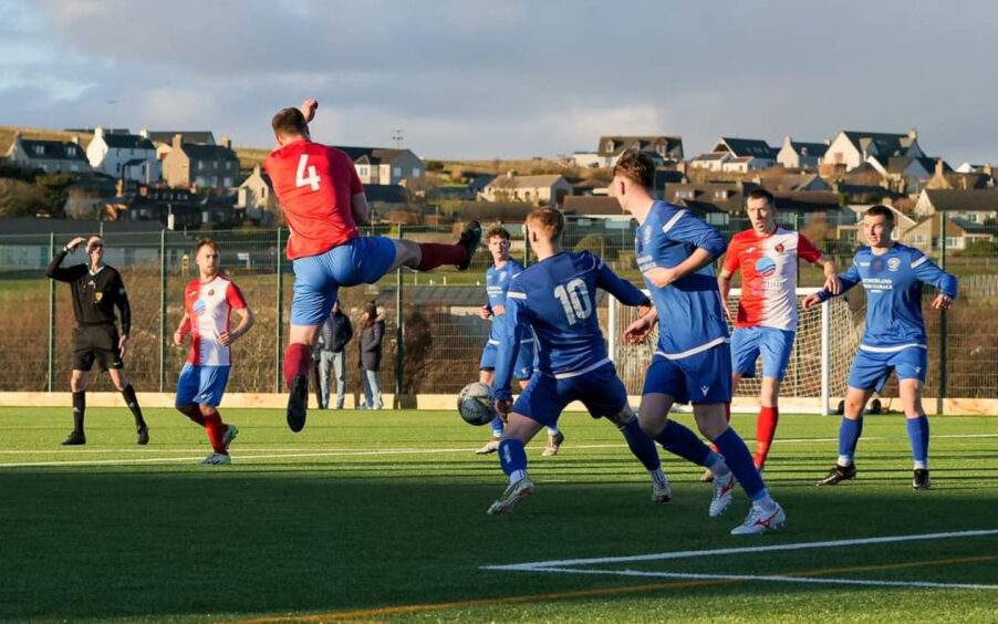 A photo of the Orkney and Golspie Sutherland players in action North Caledonian League