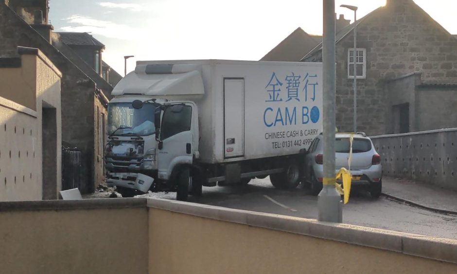 Lorry with crumpled front after crashing into a house on Convener Street in New Elgin last year due to icy roads.
