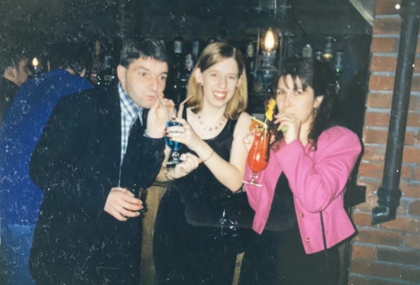 Claire Rowlands with two colleagues during a work night out in the Jailhouse