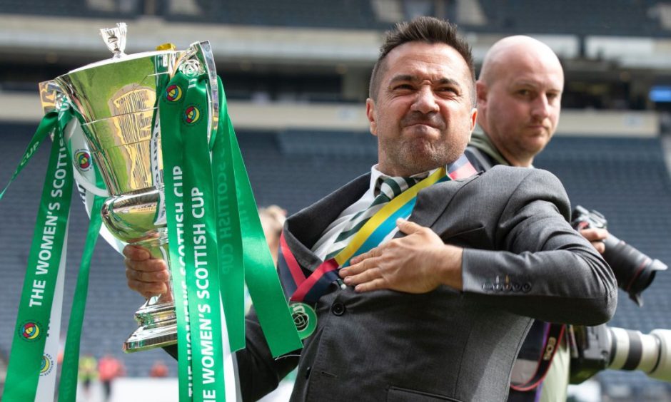 Former Celtic FC Women manager Fran Alonso holding the 2023 Scottish Cup