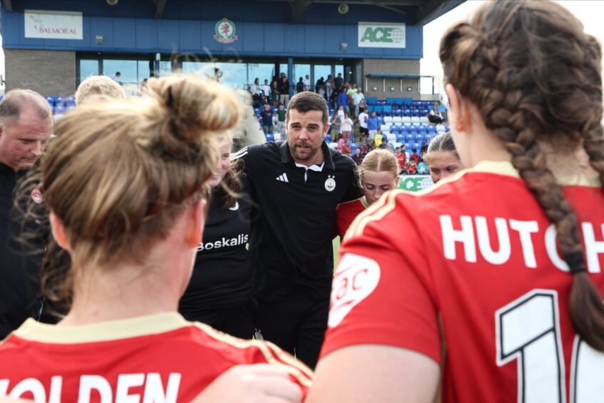 Aberdeen FC Women manager Clint Lancaster speaks to his side after a SWPL match.