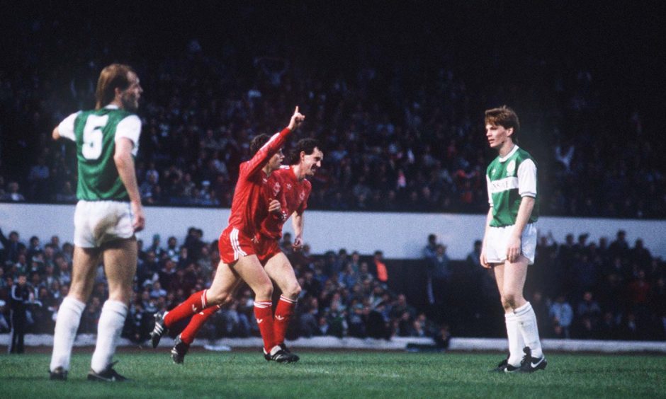 Billy Stark celebrates with Eric Black, who had just scored Aberdeen's third goal in the League Cup final win over Hibs.