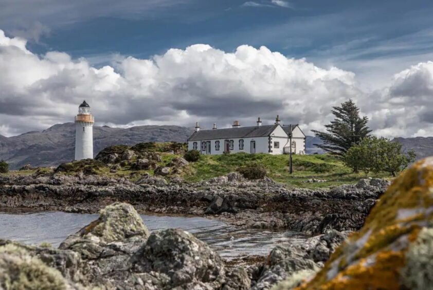 View of Eilean Sionnach Lighthouse Cottage in Skye.