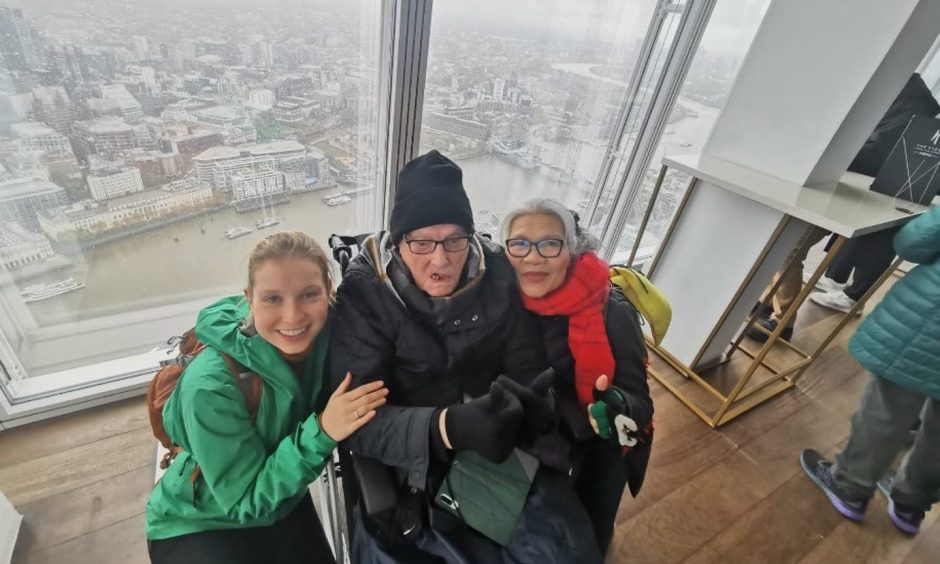 Aberdeenshire care home resident Willie McIntosh posing atop the shard.
