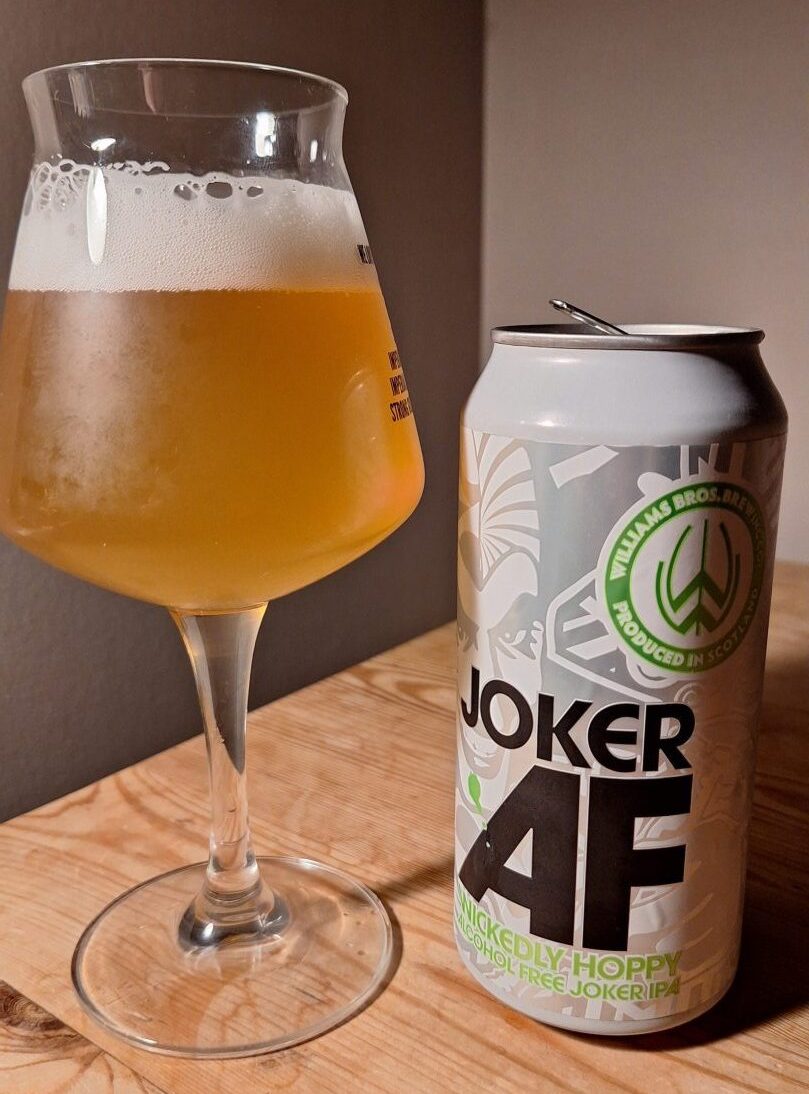 A can of Joker AF alcohol free beer poured into a glass. 