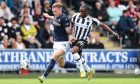 Dundee's Lee Ashcroft (left) and St Mirren's Toyosi Olusanya in action in August, which was his last appearance for the Dark Blues.