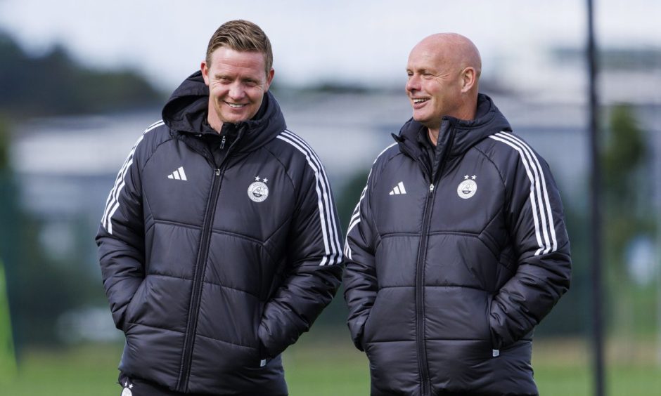 Aberdeen manager Barry Robson (L) and assistant Steve Agnew during at training session at Cormack Park