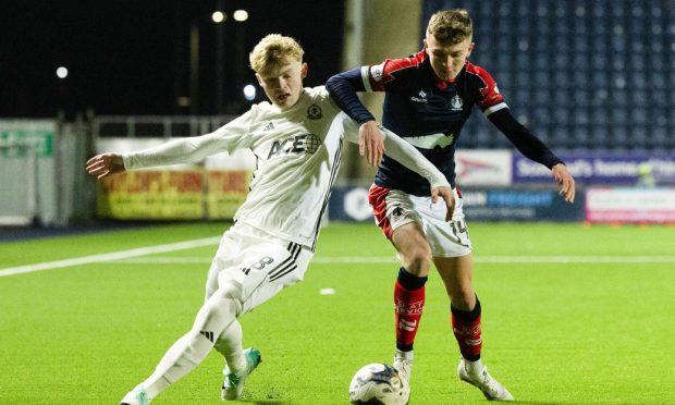 Falkirk's Finn Yeats and Cove Rangers' Tyler Mykyta battling for the ball. Image: SNS.