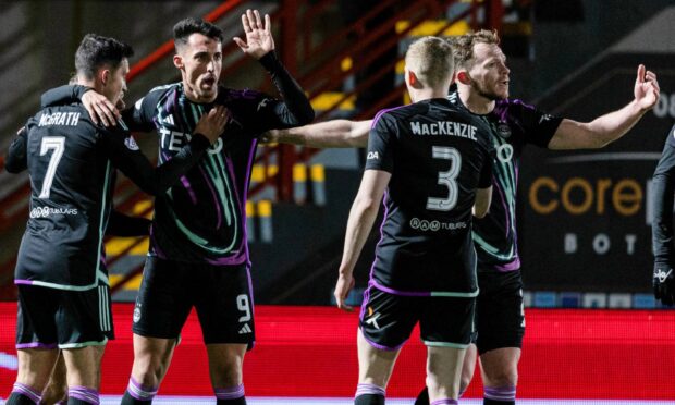 Bojan Miovski celebrates his opening goal for Aberdeen at Clyde. Image: SNS
