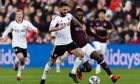 Hearts' Beni Beningime and Aberdeen's Graeme Shinnie in action at Tynecastle. Image: SNS