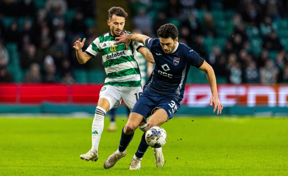 Will Nightingale in action for Ross County against Celtic. 