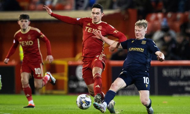 Aberdeen's Jamie McGrath (left) and Dundee's Lyall Cameron in action during the 1-1 draw in January. Image: SNS.