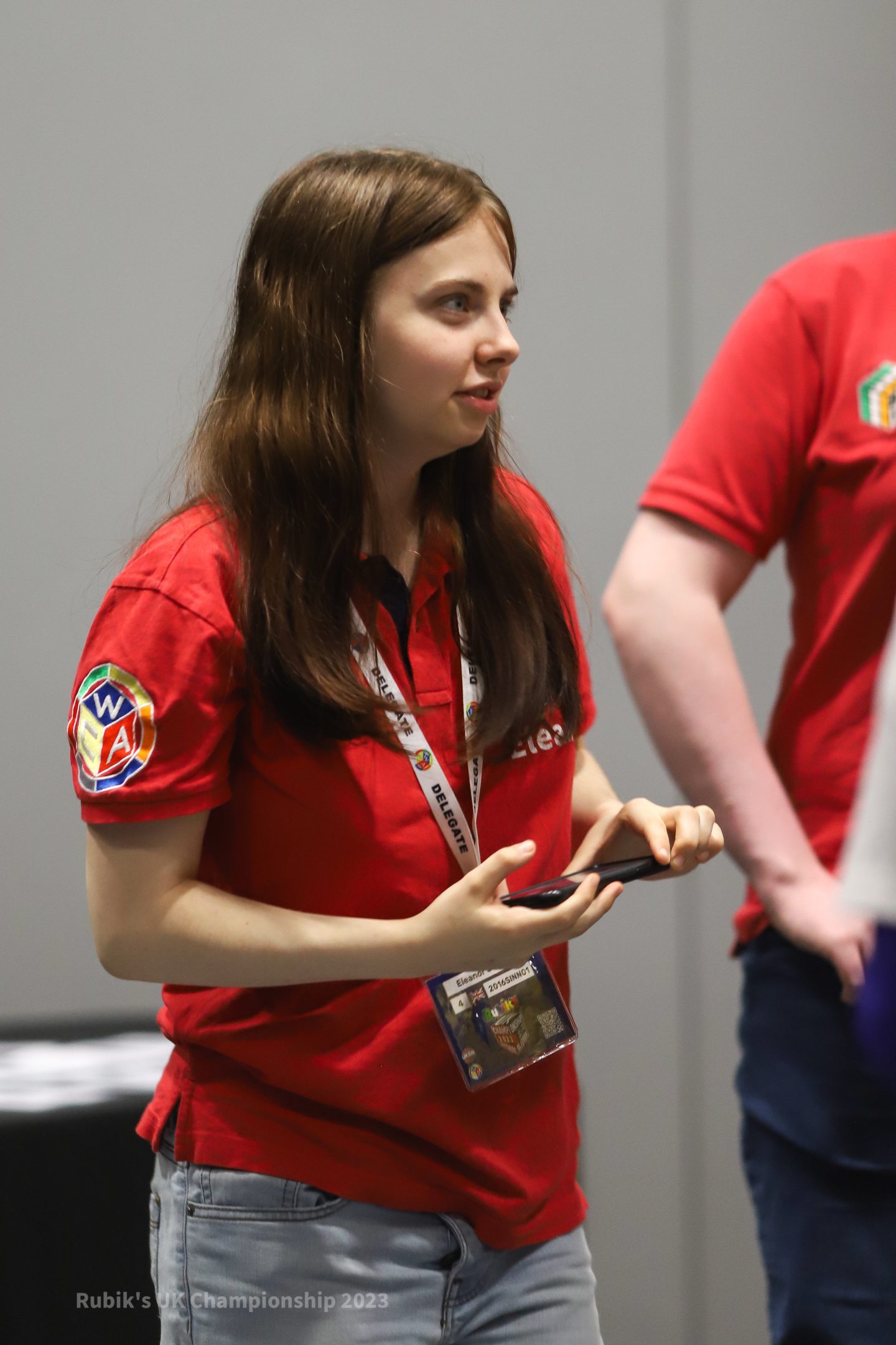 Eleanor Sinnott in a red shirt at a WCA event. 
