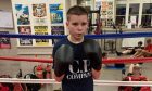 Robbie Johnsto, one of the boxers, impressed for Inverness City ABC