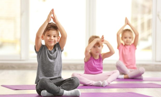 A kids yoga session is on the agenda. Image: Shutterstock.