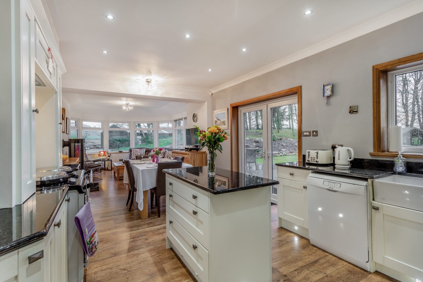 The property's sleek and stylish kitchen with views over the countryside near Aberdeen.