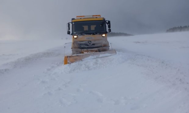 Snow being cleared from A838