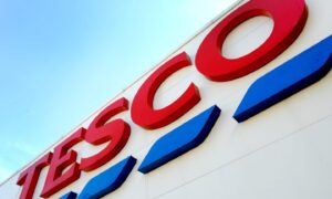 Tesco has more than 330,000 employees and a 27.3% share of the grocery market.
