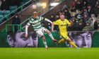 Josh Peters, right, of Buckie Thistle challenges Celtic's Liam Scales. Pictures by Darrell Benns/DCT Media