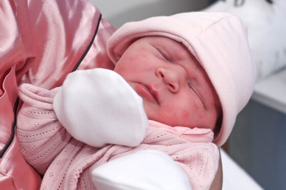 Bonnie-May Presslie was born at 12.06am - and was the joint second baby to be born in Scotland.