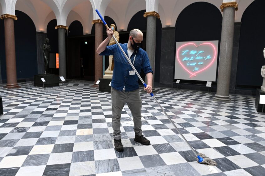 Staff get Aberdeen Art Gallery ready for reopening in April 2021.