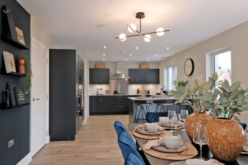 The dining area and kitchen of the Aberdeen show home