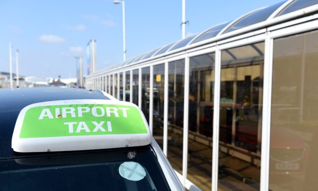 From January 3 drop-off fees for drivers of the airport's official taxi firm will increase from £2 to £5. Image: Darrell Benns/ DC Thomson.