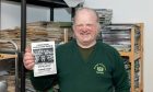Buckie Thistle historian Easton Thain with the programme from their 1989 meeting with Celtic.