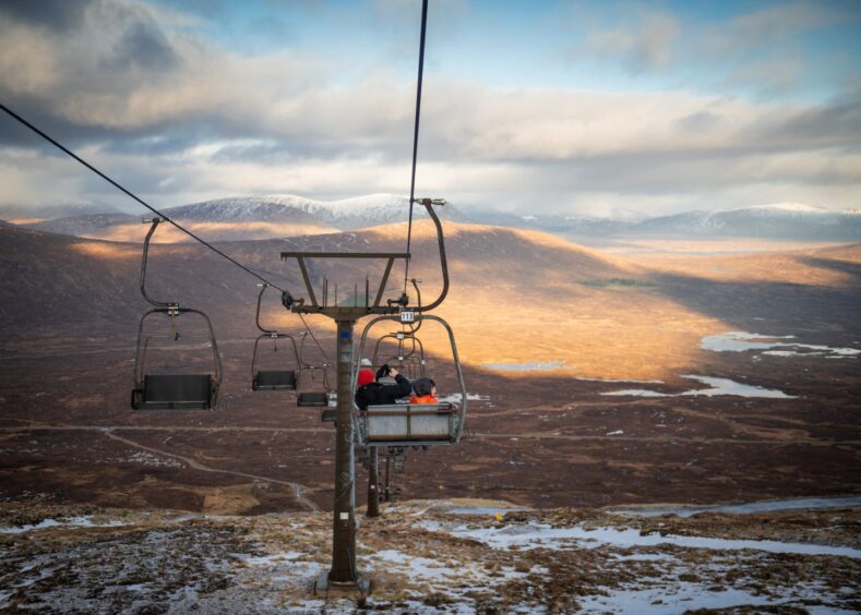 With a lack of snow for skiing and snowboarding - Glencoe Mountain resort is offering sledging free with a ticket for the chairlift, as this picture shows.