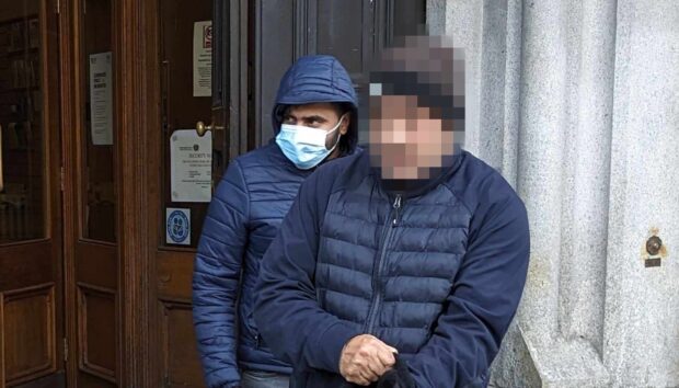 Junaid Muhammed Naheed attempted to hide his face from cameras as he left court. Image: DC Thomson.
