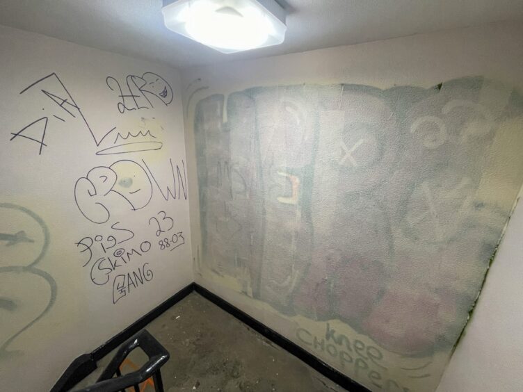 Graffiti and vandalism that has been painted over in Cairncry Court in Aberdeen.