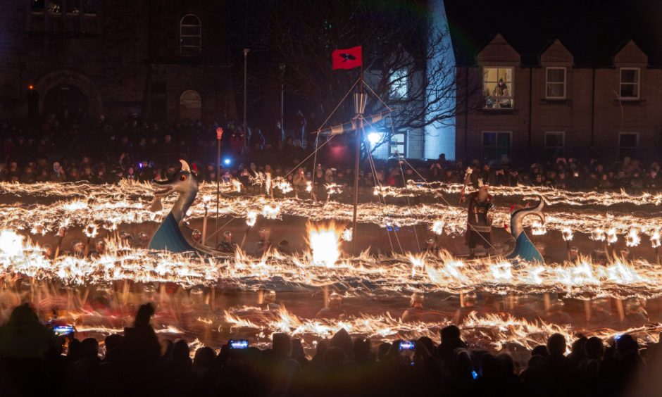 The longship encircled by torches at Up Helly Aa 2024.