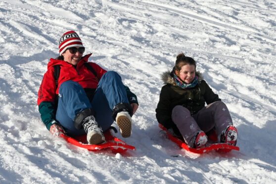 Sledders enjoy the snow in Aberdeen.