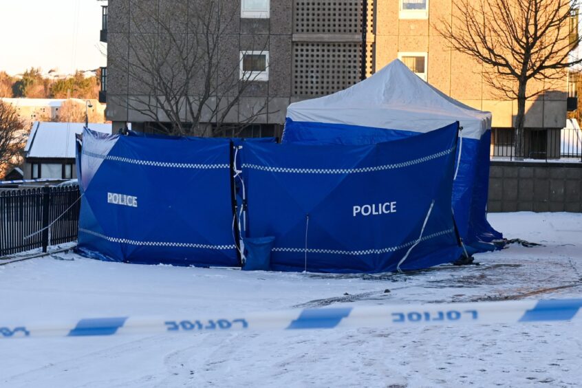 Blue police tent outside Elphinstone Court 