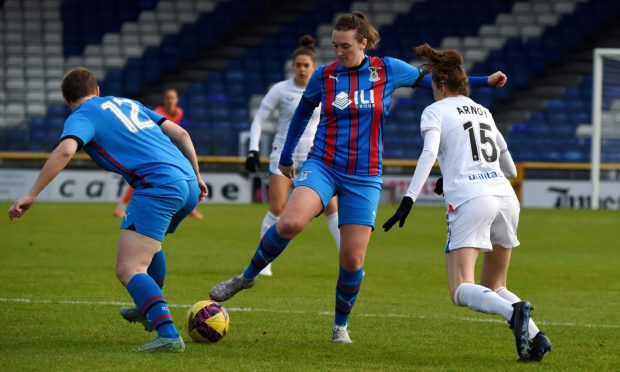Caley Thistle Women winger Katie Cleland comes up against Rangers striker Lizzie Arnot in a Scottish Cup clash at the Caledonian Stadium.