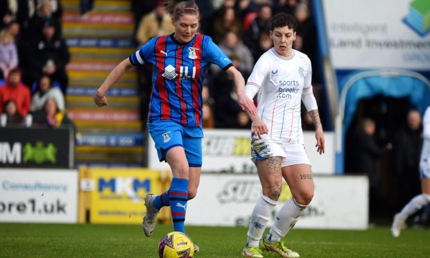 Caley Thistle Women captain Kirsty Deans and Rangers' Sarah Ewens in action in the Scottish Cup at the Caledonian Stadium. Image: Kenny Elrick/DC Thomson.