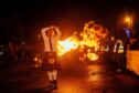 A participant whirls his fireball during the event. Image: Kath Flannery/DC Thomson