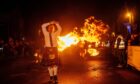 A participant whirls his fireball during the event. Image: Kath Flannery/DC Thomson