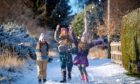 Children playing in snow.