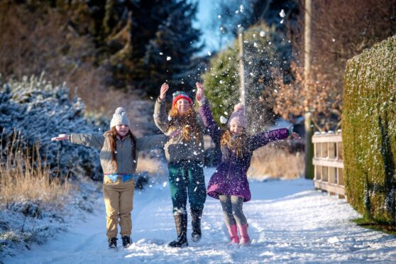 Children playing in snow.